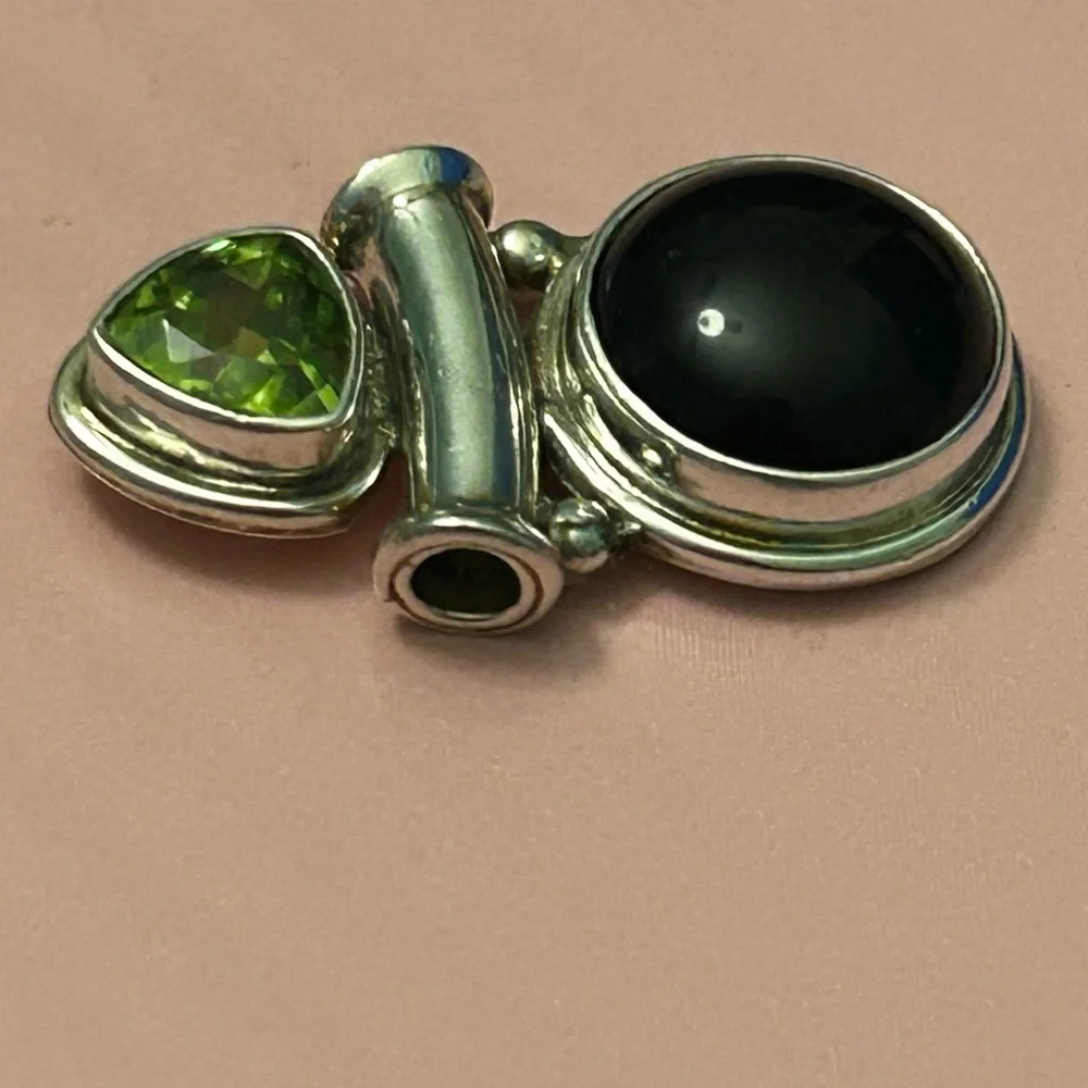 Vintage artisan made black onyx and peridot 925 silver slide pendant.